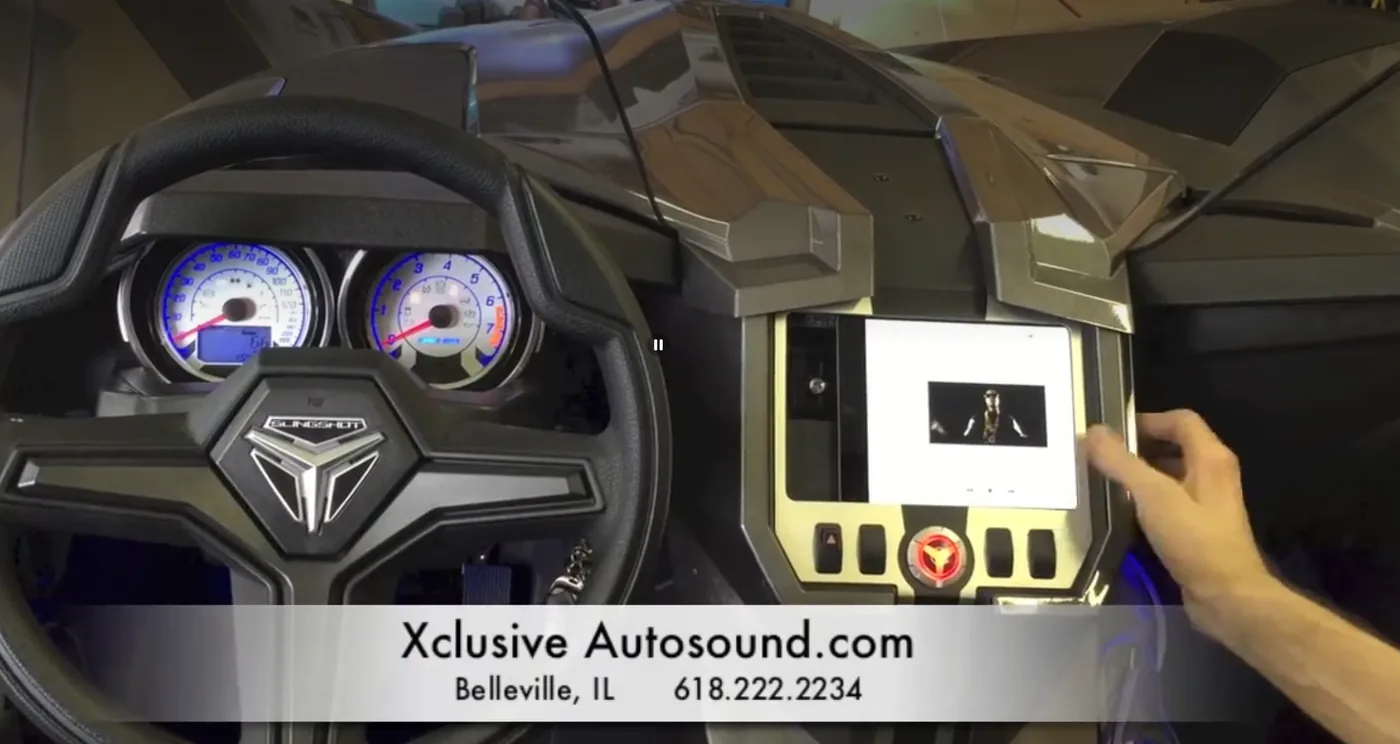 Custom iPad Mini install in a 2015 Polaris Slingshot dash, recessed and lit on the Xclusive Autosound screen